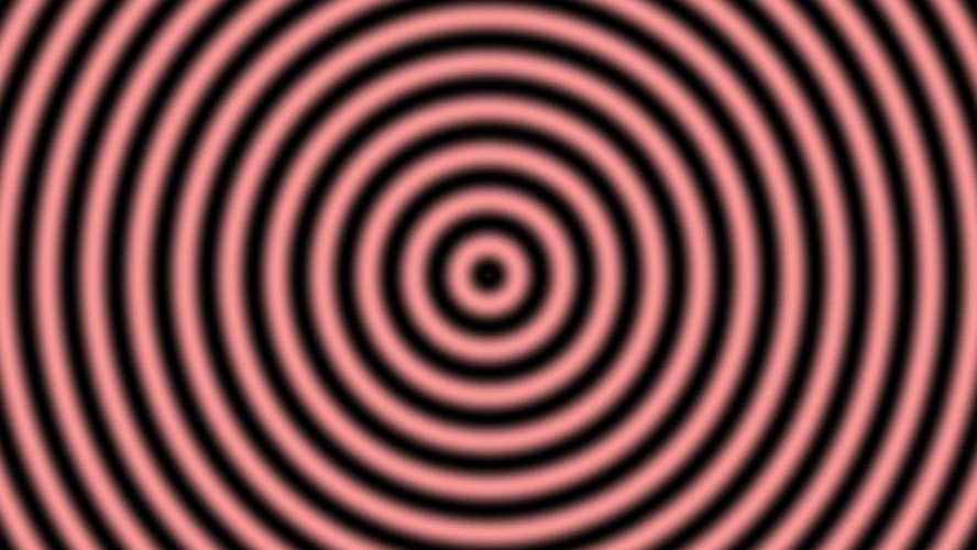 Salmon-pink rings on black, bright on the beat.